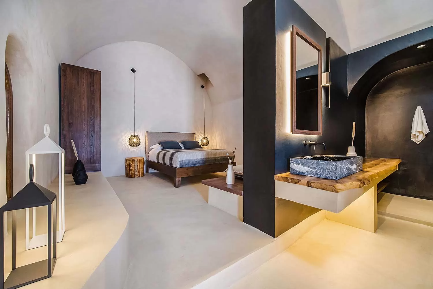 Cave suite with stone basin and lantern lighting