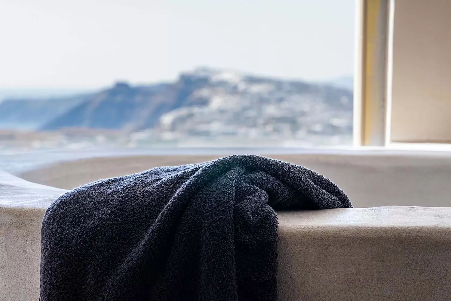 View across Santorini from a suite window at Phaos 1870