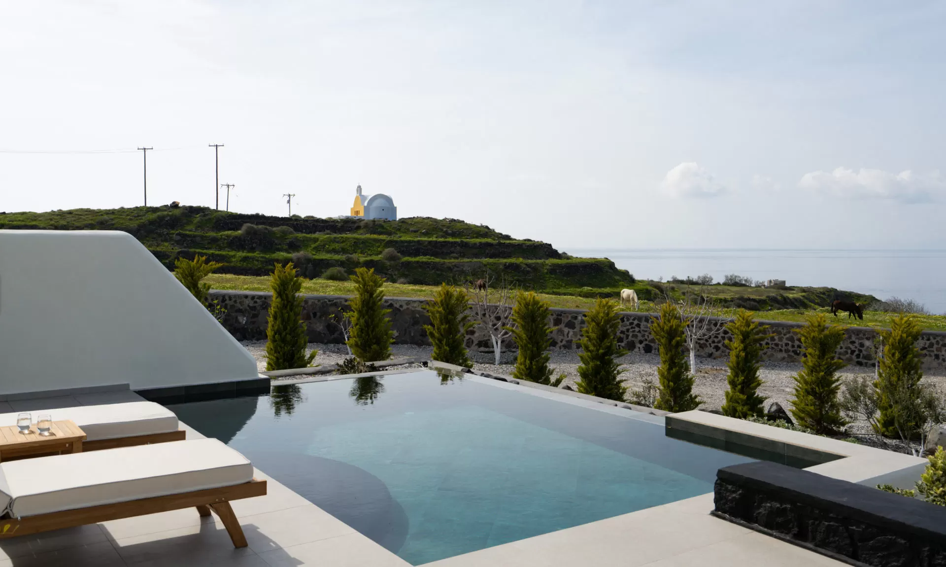Pool terrace looking out over the countryside towards the sea